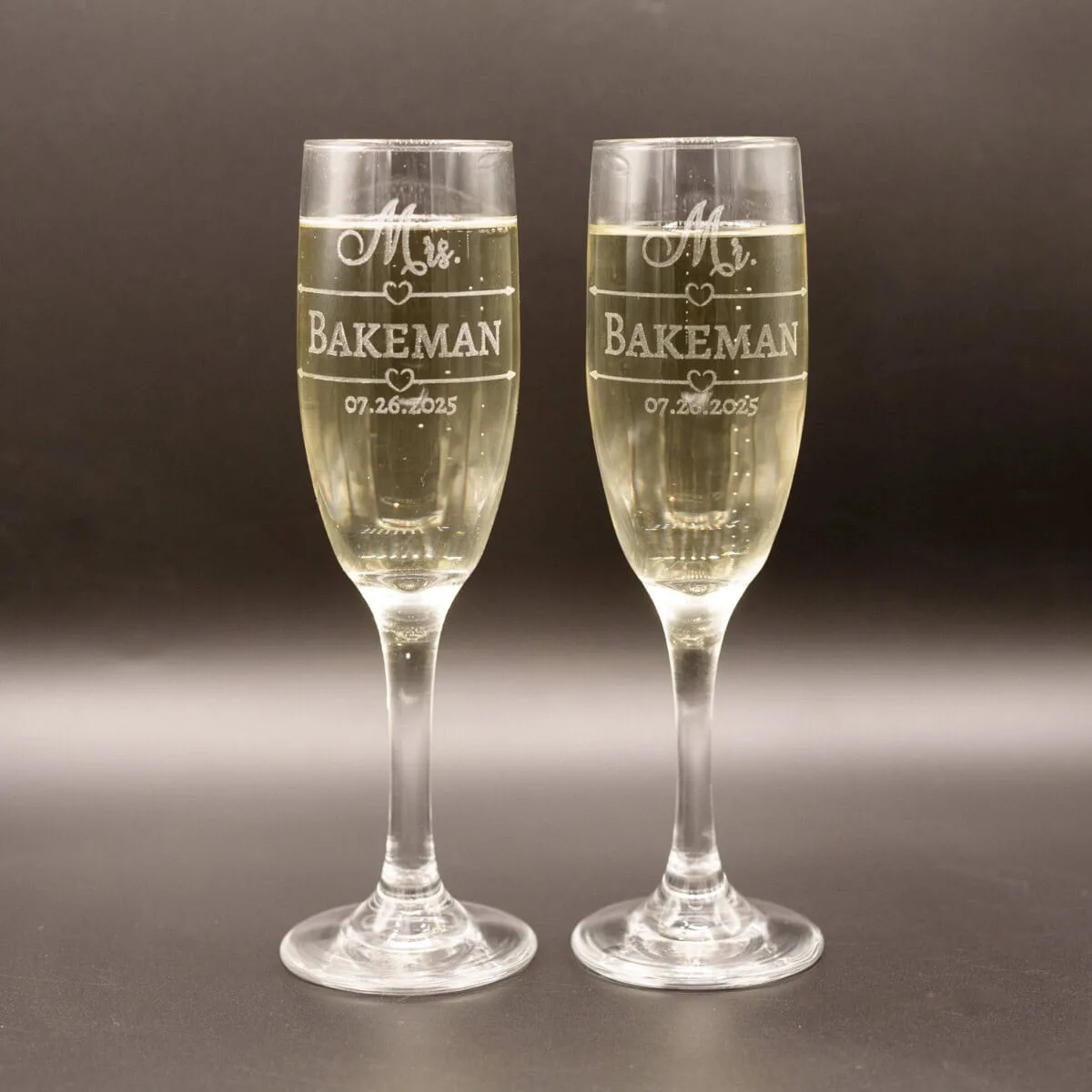 Custom Laser Etched Wedding Champagne Flutes - Set of 2 with names and date.