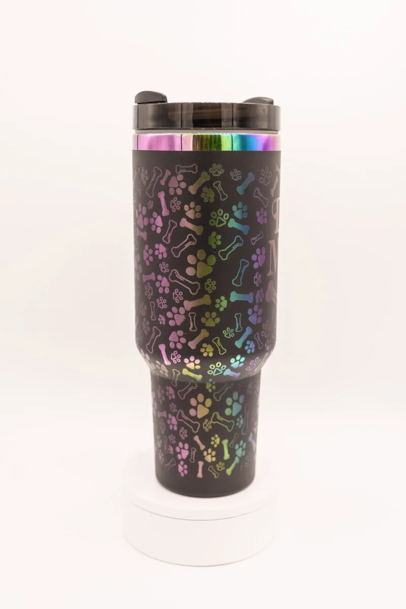 Custom dog mom 40oz stainless steel tumbler with engraved pet names and pictures.