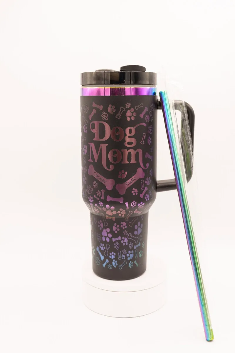 Engraved Dog Mom tumbler with pet names and pictures, perfect for dog lovers. Custom stainless steel.