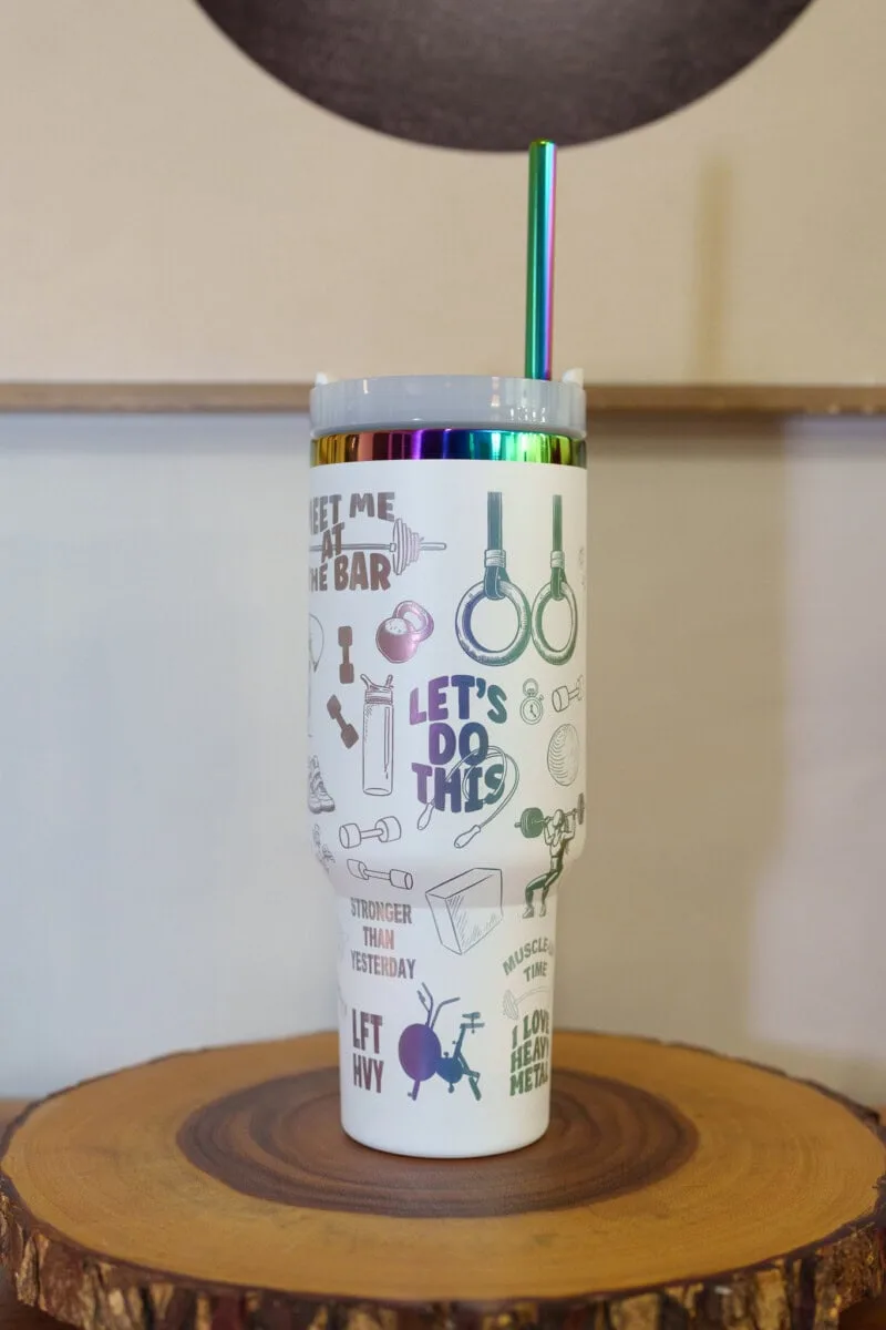 Insulated stainless steel tumbler with fitness and gym-themed design for women.