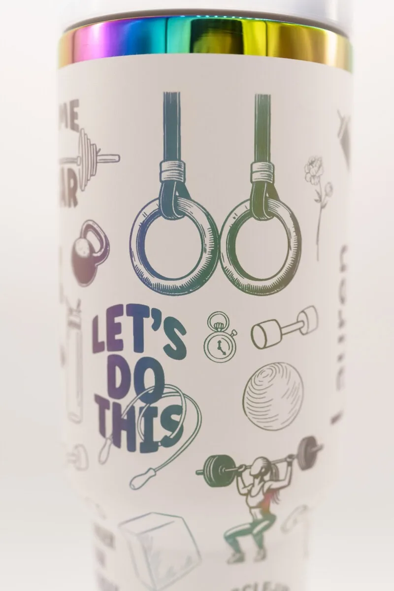 Custom female-themed workout tumbler with fitness icons and motivational slogans.