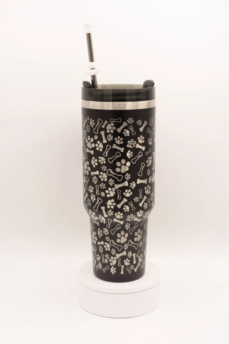 Custom dog mom engraved 40oz stainless steel tumbler with pet names and pictures.