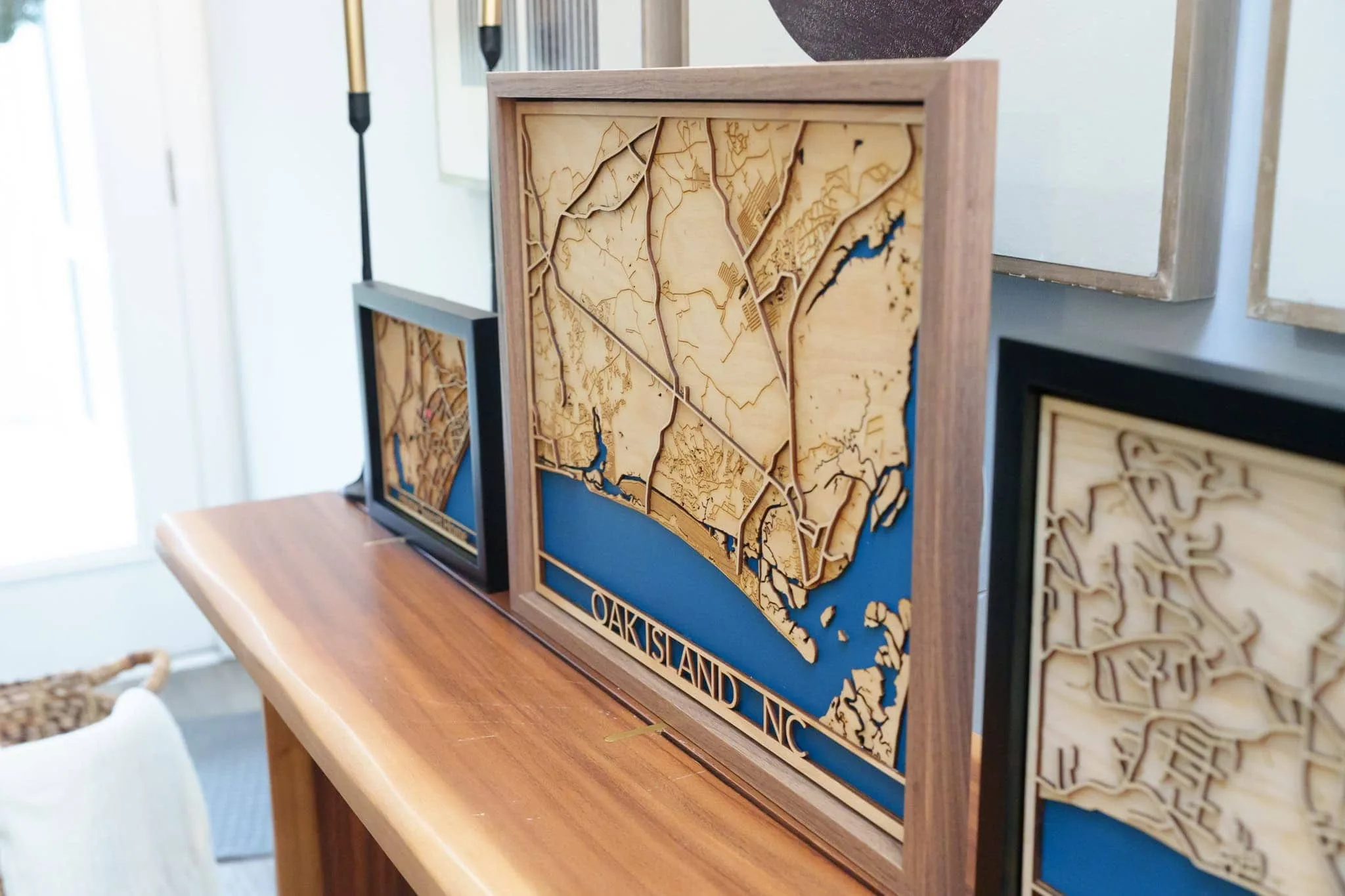 Custom laser cut map art of Oak Island, NC with detailed shoreline and waterways.