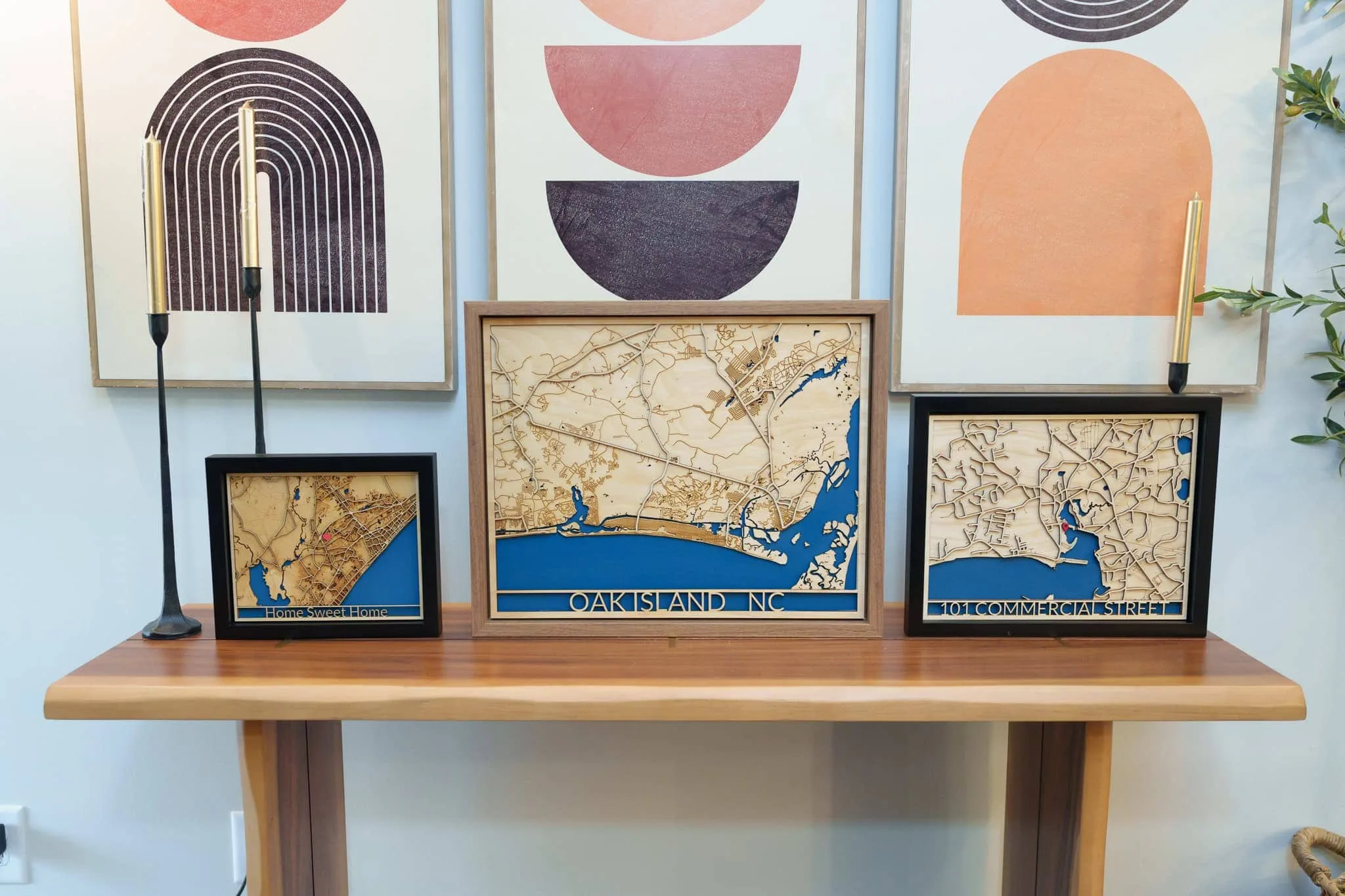 Laser cut map of Oakland, NC with detailed waterways and streets.
