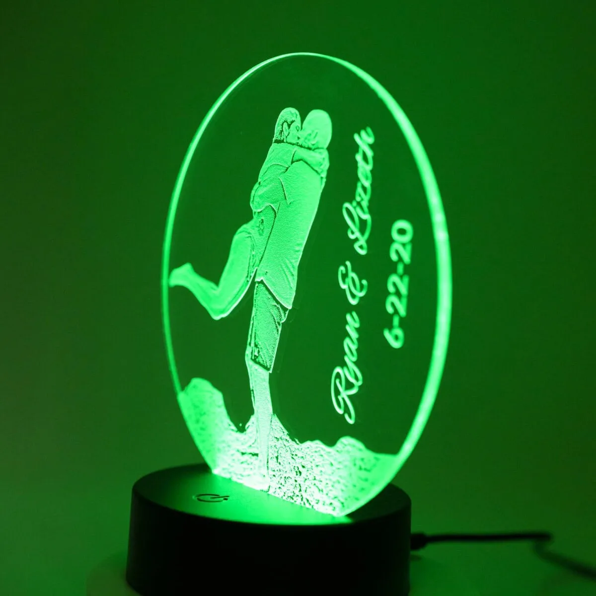 Custom engraved night light featuring a golfer silhouette and personalized text for special occasion.